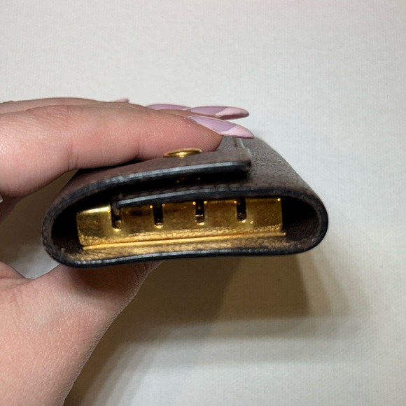 Hermès Black Leather Key Holder with Gold Accents - Picture 9 of 10